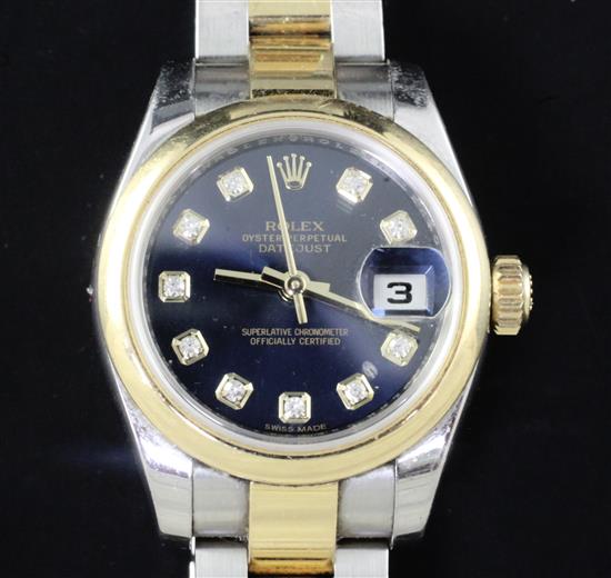 A ladys stainless steel and yellow gold Rolex Oyster Perpetual Datejust wristwatch with dark bLue dial and diamond-set numerals, boxed